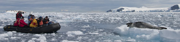 Zodiac cruising along the Antarctic Peninsula by Ted Cheeseman