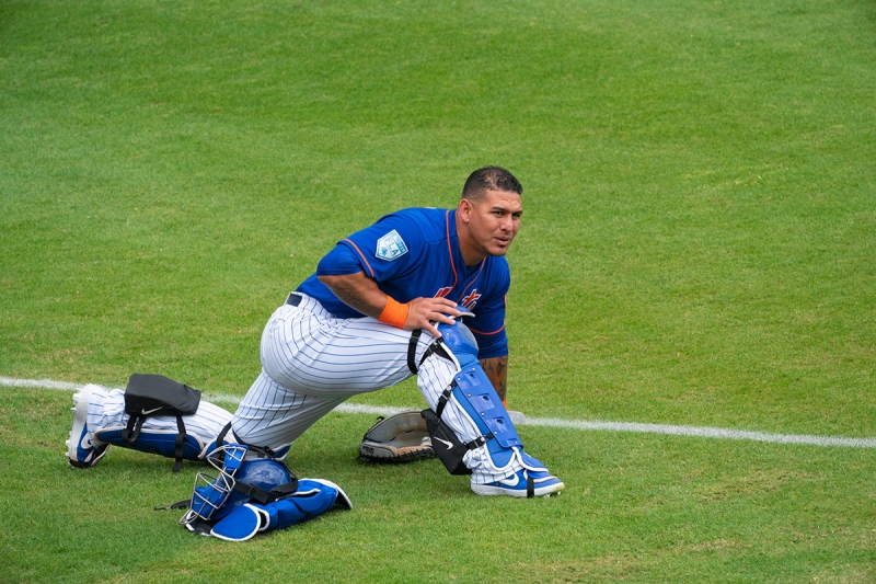 Mets-catcher-stretching-_A9A5343-First-Data-Field,-Port-St.-Lucie,-FL-